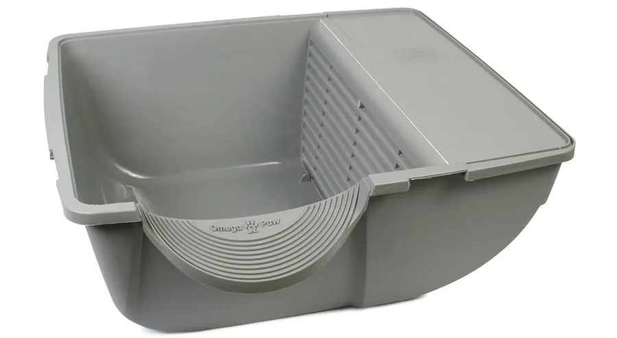 Intérieur de l'Omega Paw : grille de tamisage brevetée qui sépare les déchets